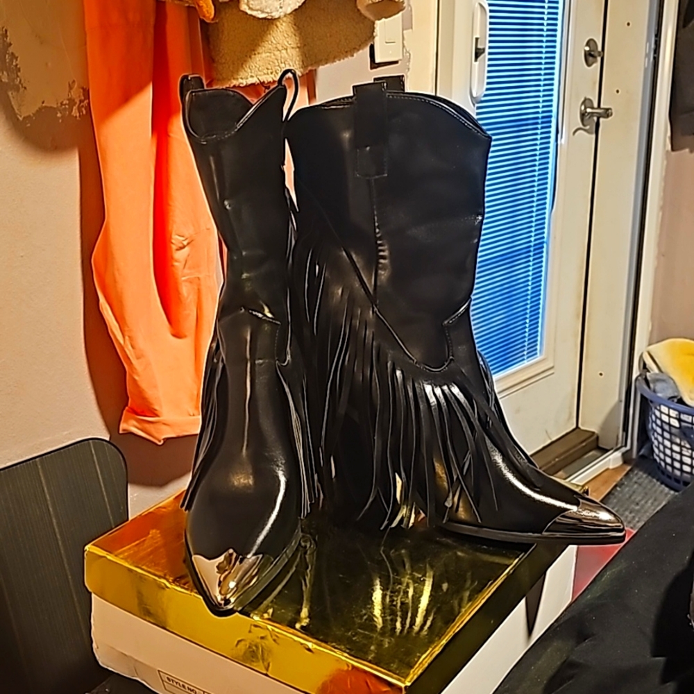Black cowboy boots with tassles